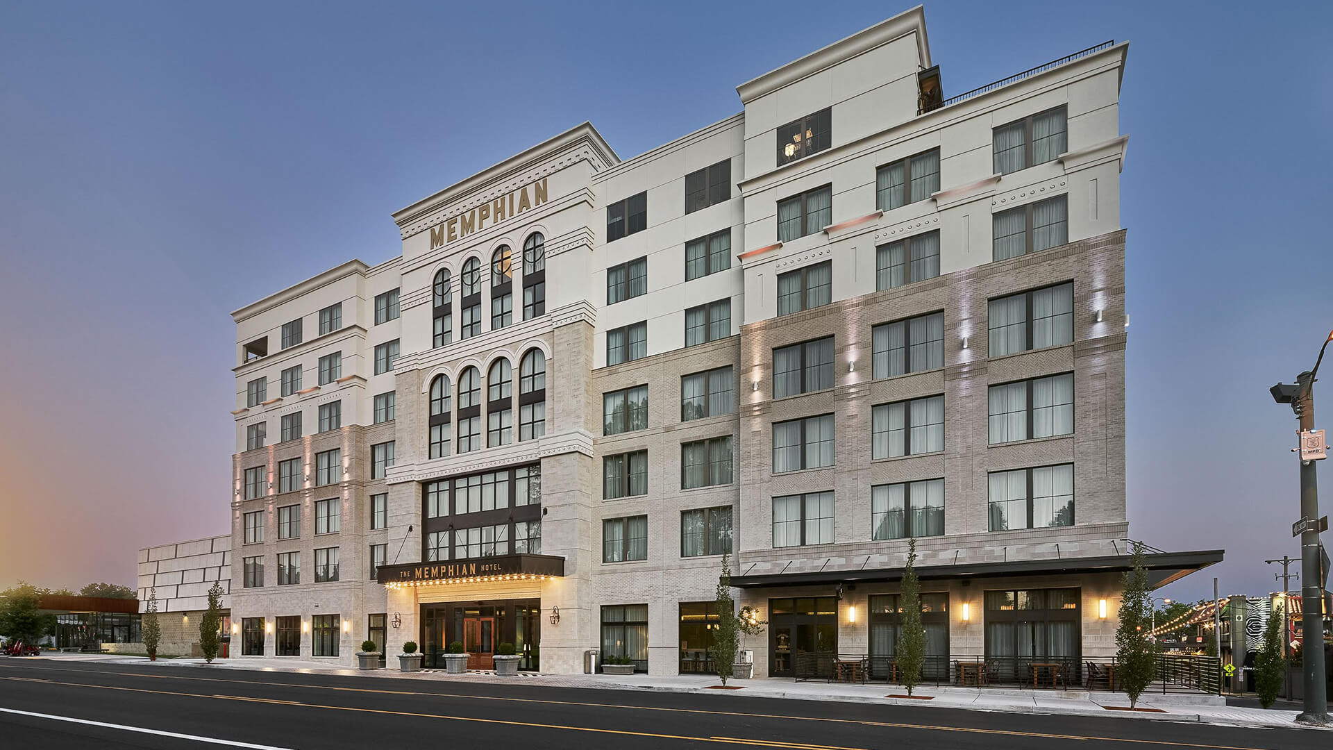 The Memphian hotel in Overton Square at dusk