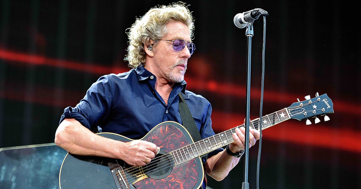 Roger Daltrey performing with an acoustic guitar